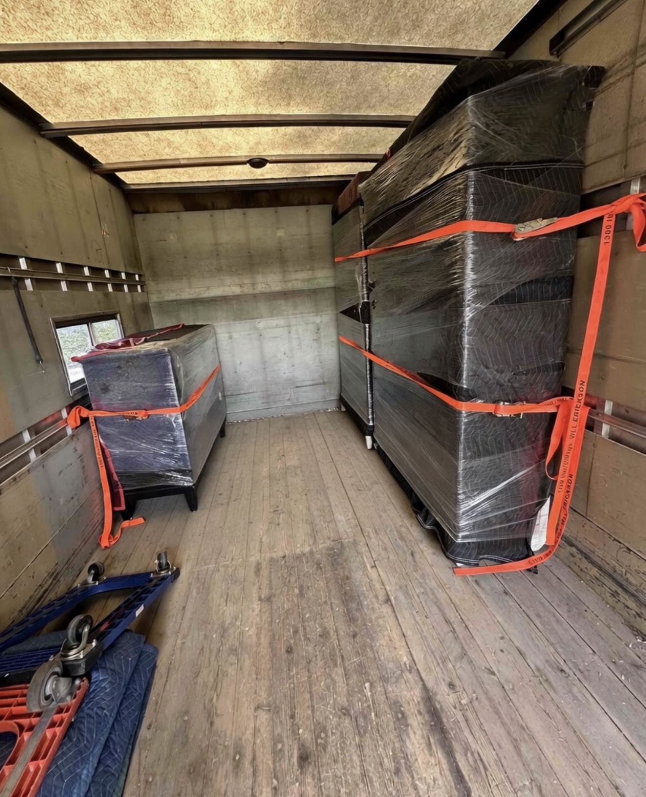 Furniture securely wrapped and strapped inside a Horizon Moving truck