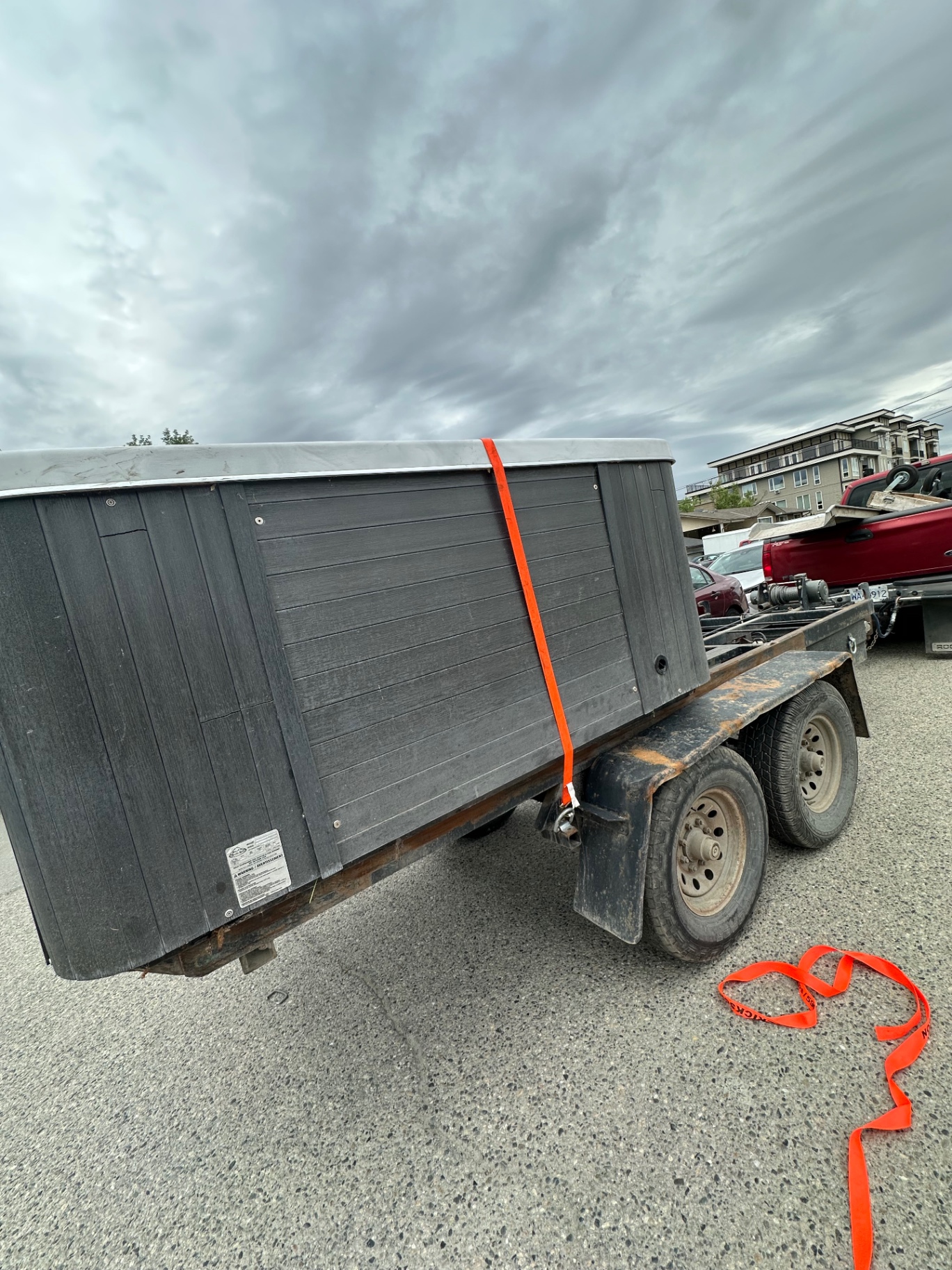 Hot tub strapped to a trailer for transport across the Okanagan